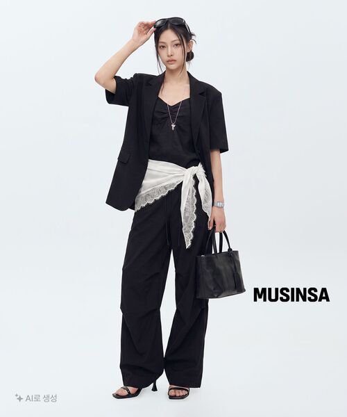 MUSINSA STANDARD WOMAN（ムシンサスタンダードウーマン）の「ウィメンズパラシュートパンツ[ブラック]（スウェットパンツ・レディース・その他・30/24/26/28/22）」の12枚目の写真