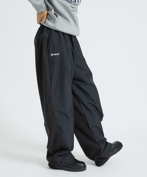 +phenix(プラスフェニックス)の「【+phenix / プラスフェニックス】GORE-TEX WINDSTOPPER FLEECE DOCKING PANTS / ゴアテックス ウインドストッパー フリースドッキングパンツ(その他パンツ・メンズ・ブラック/ネイビー・L/M)」の2枚目の写真