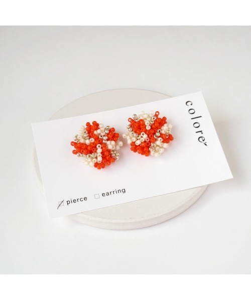 tone(トーン)の「【colore】】【金属アレルギー対応】ニュアンス柄 ビーズの大粒ピアス(MA)(ピアス(両耳用)・レディース・オレンジ・FREE)」の1枚目の写真