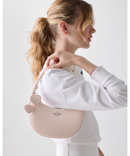 kate spade new york(ケイトスペード ニューヨーク)の「ノヴァ ブレイデッド ハンドル スモール クレセント クロスボディ バッグ(ショルダーバッグ・レディース・ピンク・ONESIZE)」の5枚目の写真