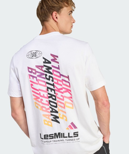 adidas(アディダス)の「Les Mills ツアーグラフィックTシャツ / アディダス adidas(Tシャツ/カットソー・メンズ・ホワイト・XX-LARGE/XX-SMALL/3XL/LARGE/MEDIUM/SMALL/X-LARGE/X-SMALL)」の1枚目の写真
