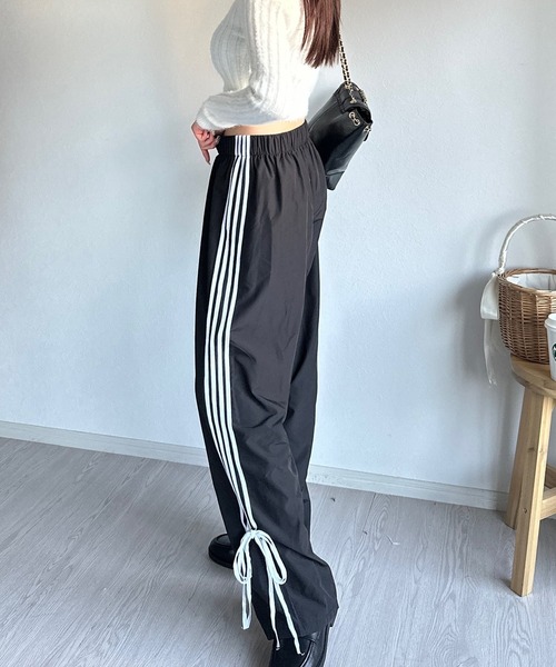Silly（シリー）の「【韓国っぽトレンドアイテム！】サイドリボントラックパンツ（その他パンツ・レディース・ブラック・LARGE/MEDIUM）」の13枚目の写真