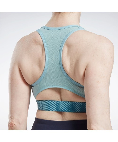 Reebok(リーボック)の「ルクス レーサー ブラ / TS Lux Per Racer Bra- AOP【返品不可商品】(スポーツブラ・レディース・ブルー/ブラック・X-SMALL/SMALL/MEDIUM/LARGE/X-LARGE)」の3枚目の写真