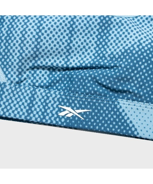 Reebok(リーボック)の「ルクス レーサー ブラ / TS Lux Per Racer Bra- AOP【返品不可商品】(スポーツブラ・レディース・ブルー/ブラック・X-SMALL/SMALL/MEDIUM/LARGE/X-LARGE)」の6枚目の写真
