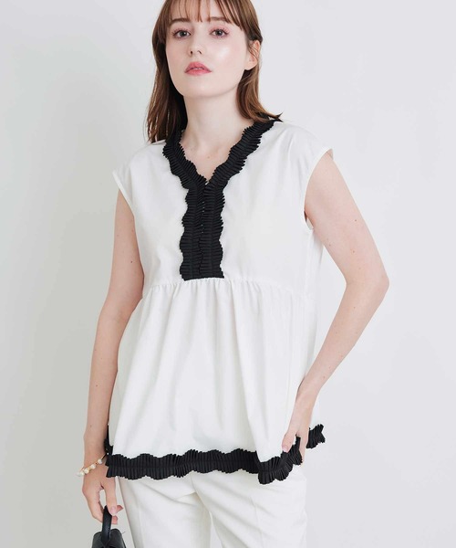 PICCIN PERLA(ピッチンペルラ)の「タックプリーツペプラムブラウス(シャツ/ブラウス・レディース・ブラック/オフホワイト・M)」の7枚目の写真