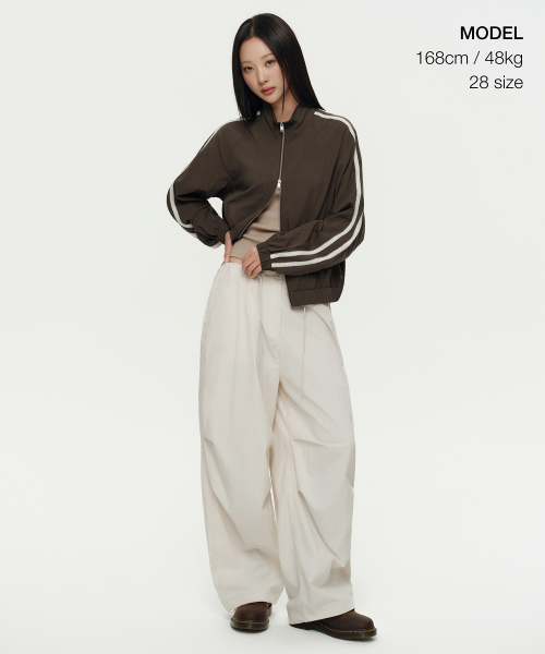 MUSINSA STANDARD WOMAN（ムシンサスタンダードウーマン）の「ウィメンズパラシュートパンツ [クリーム]（スウェットパンツ・レディース・その他・30/24/26/28/22）」の2枚目の写真