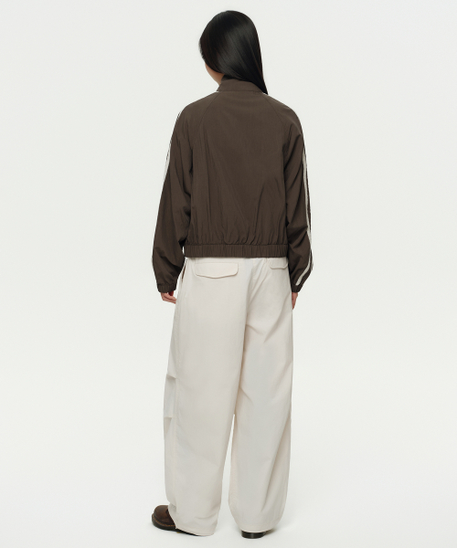 MUSINSA STANDARD WOMAN（ムシンサスタンダードウーマン）の「ウィメンズパラシュートパンツ [クリーム]（スウェットパンツ・レディース・その他・30/24/26/28/22）」の3枚目の写真