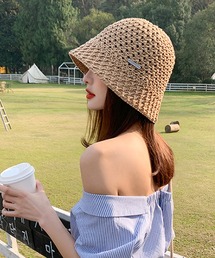 shopnikoniko（ショップニコニコ）の「バケットハット ストロー 深め ペーパー 麦わら チャーム付き クローシュハット（ハット）」