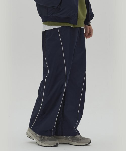 SECONDMONO（セカンドモノローグ）の「ベースボールカーブドワイドナイロンパンツ（起毛）ネイビー_SEPT028NAVY（スウェットパンツ・レディース・その他・LARGE/MEDIUM）」の5枚目の写真