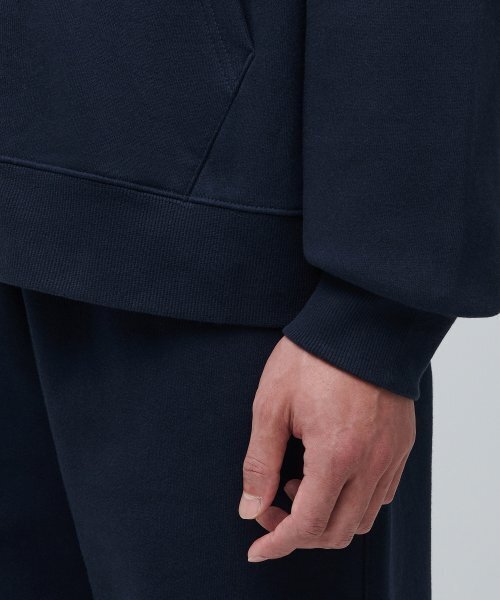 MUSINSA STANDARD（ムシンサスタンダード）の「フリースフード付きセータージップアップ[ネイビー]（パーカー・メンズ・その他・MEDIUM/LARGE/X-LARGE/XX-LARGE/XXX-LARGE）」の9枚目の写真