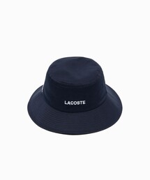 LACOSTE（ラコステ）の「ブランドネームロゴ刺繍エッセンシャルバケットハット（ハット）」