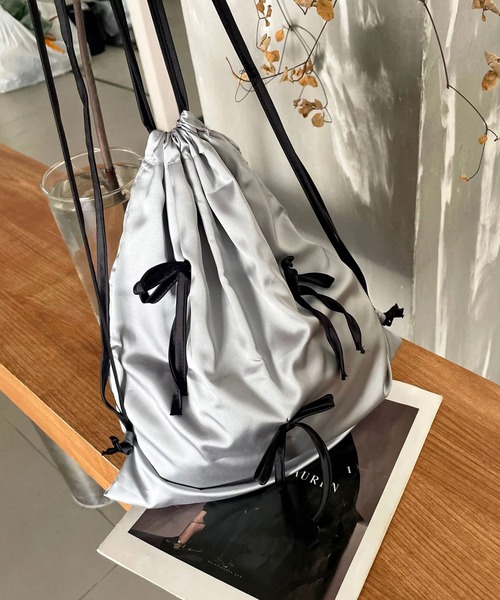 MEMECLE（メメクル）の「【 MEMECLE / メメクル 】リボンナップサック（バックパック/リュック・レディース・パープル/ホワイト/ブラック/シルバー・FREE）」の21枚目の写真