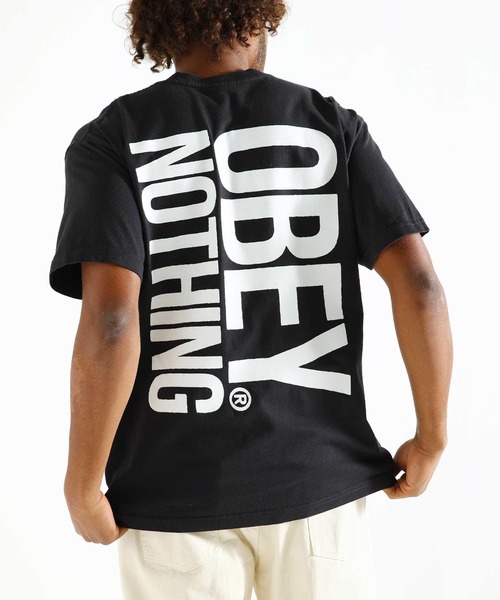 OBEY(オベイ)の「OBEY/オベイ 半袖Tシャツ リラックスシルエット コットン 166913719(Tシャツ/カットソー・メンズ・ホワイト/スミクロ・M/L/XL)」の1枚目の写真