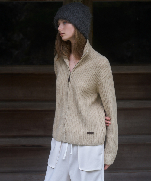 ANDNEEDS(アンドニーズ)の「Grinch pola zip-up knit (oatmeal)(カーディガン/ボレロ・レディース・その他・FREE)」の1枚目の写真