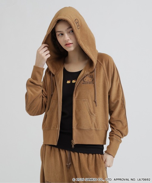 AVIREX（アヴィレックス）の「《AVIREX×HELLO KITTY》PILE PARKA（パーカー・レディース・ライトブラウン/ネイビー・S/M）」の7枚目の写真