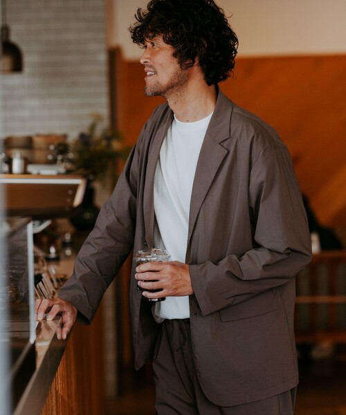green label relaxing(グリーンレーベルリラクシング)の「WONDER CLOTH カジュアル ジャケット -ストレッチ・接触冷感・吸水速乾-(テーラードジャケット・メンズ・モカ/ダークグレー/ブラック・L/M/S/XL)」の1枚目の写真