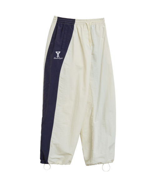 YALE(イェール)の「ブルドッグス トラックパンツ_アイボリー(スウェットパンツ・レディース・その他・SMALL/MEDIUM/LARGE/X-LARGE)」の1枚目の写真