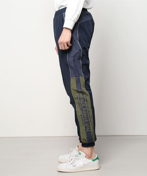 adidas(アディダス)の「adidas/アディダス THREE STRIPES ナイロンジョガーパンツ/セットアップ対応 V8565(その他パンツ・メンズ・ネイビー/ブラック・M/O/L)」の4枚目の写真