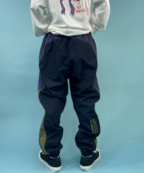 adidas(アディダス)の「adidas/アディダス THREE STRIPES ナイロンジョガーパンツ/セットアップ対応 V8565(その他パンツ・メンズ・ネイビー/ブラック・M/O/L)」の6枚目の写真