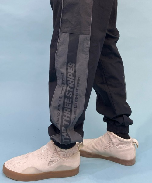 adidas(アディダス)の「adidas/アディダス THREE STRIPES ナイロンジョガーパンツ/セットアップ対応 V8565(その他パンツ・メンズ・ネイビー/ブラック・M/O/L)」の19枚目の写真