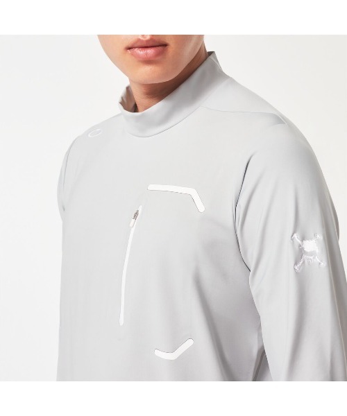 [オークリー] Polo Shirt SKULL SYNCHRONISM MOCK SHIRT 2.0 COOL GRAY 2 Mサイズ相当 OAKLEY（オークリー）の「オークリー SKULL SYNCHRONISM LS MOCK SHIRT