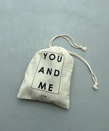 y/m（イム）の「YOU AND ME 巾着（ポーチ）」