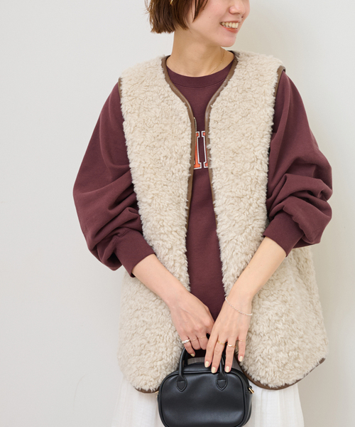 JOURNAL STANDARD relume(ジャーナルスタンダード レリューム)の「《追加2》シープフェイクファージップベスト(ブルゾン・レディース・アイボリー/チャコールグレー・FREE)」の2枚目の写真
