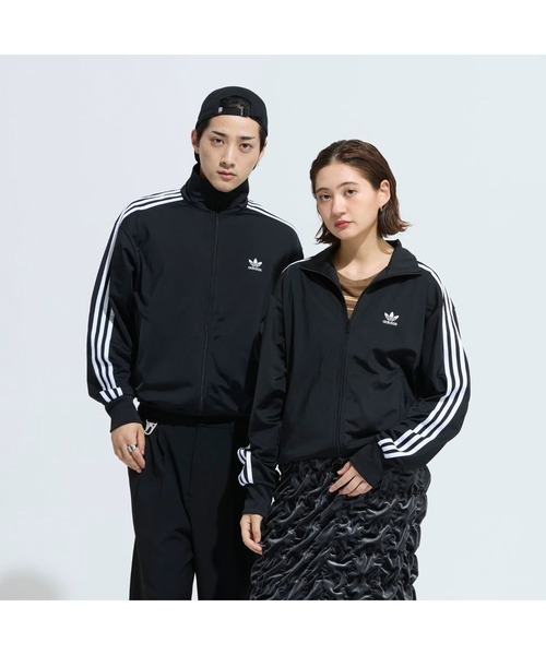 adidas(アディダス)の「アディダス 【adidas】- ジャージ【adicolor Classics Firebird Track Top(Jersey) "Black / White" FWE48-IJ7058】(ジャージ・メンズ・ブラック×ホワイト・LARGE/MEDIUM)」の1枚目の写真