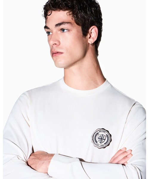 ARMANI EXCHANGE（アルマーニエクスチェンジ）の「【A|X アルマーニ エクスチェンジ】CO エンブレムロゴ レギュラーフィット 長袖クルーネックTシャツ/REGULAR（Tシャツ/カットソー・メンズ・オフホワイト・XX-LARGE/X-SMALL/X-LARGE/SMALL/MEDIUM/LARGE）」の4枚目の写真
