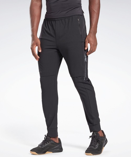 Reebok(リーボック)の「パフォーマンス トラックパンツ / Performance Track Pants(その他パンツ・メンズ・ブラック・SMALL/MEDIUM/LARGE/X-LARGE/XX-LARGE/X-SMALL)」の1枚目の写真