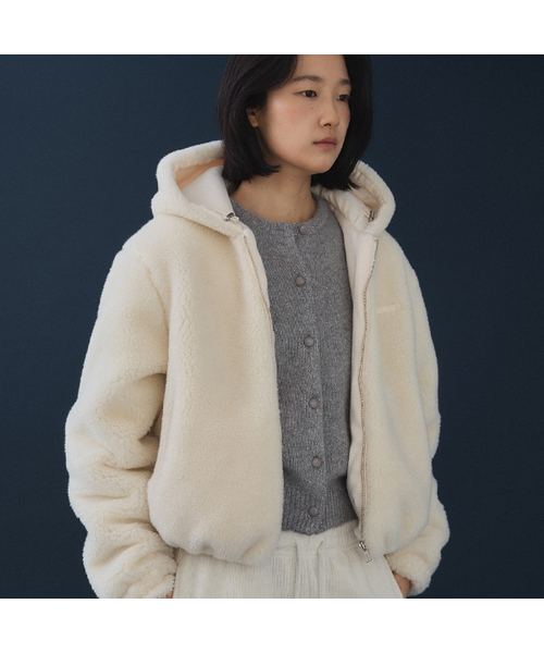 HOWUS(ホワス)の「TEDDY HOODED FUR JACKET (IVORY)(ムートンコート・レディース・アイボリー・ONE SIZE)」の1枚目の写真