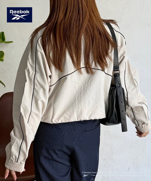 Reebok（リーボック）の「【Reebok】ナイロンブルゾン（ブルゾン・レディース・ネイビー/アイボリー/チャコールグレー・FREE）」の9枚目の写真