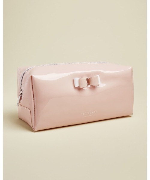 Ted Baker リボン メイクアップポーチ Ｌ Ted Baker（テッドベーカー）の「HAIYLEY リボン付き PV コスメ