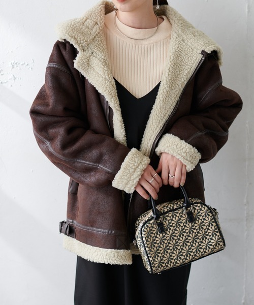 DISCOAT（ディスコート）の「フェイクムートンB-3ジャケット（ムートンコート・レディース・ブラック/ブラウン/ホワイト系その他・MEDIUM/LARGE）」の3枚目の写真