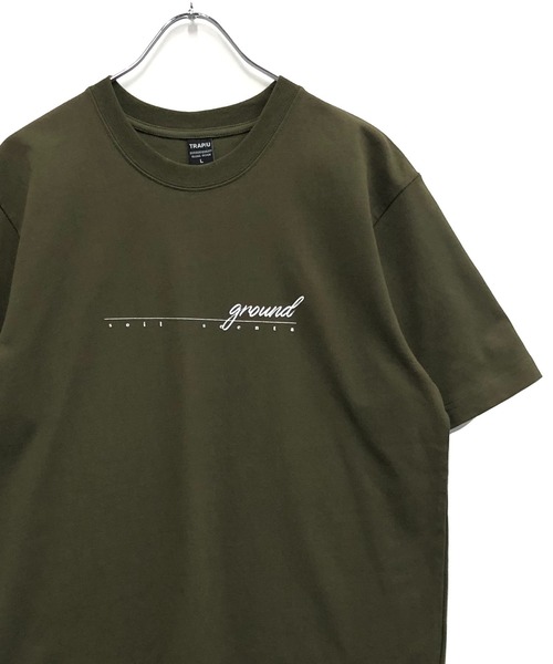 TRAP/U (トラップユー)の「コットン天竺 / メッセージロゴプリント クルーネックTシャツ(半袖)(Tシャツ/カットソー・メンズ・ホワイト/ブラック/オリーブ・M/L)」の1枚目の写真