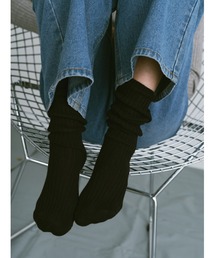 un/neu（アンノイ）の「リブルーズソックス（ソックス/靴下）」