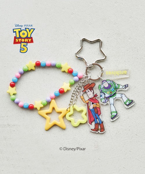 archives(アルシーヴ)の「【TOY STORY】ウッディ&バズ/ジャラジャラチャーム(チャーム・レディース・ブラウン・FREE)」の1枚目の写真