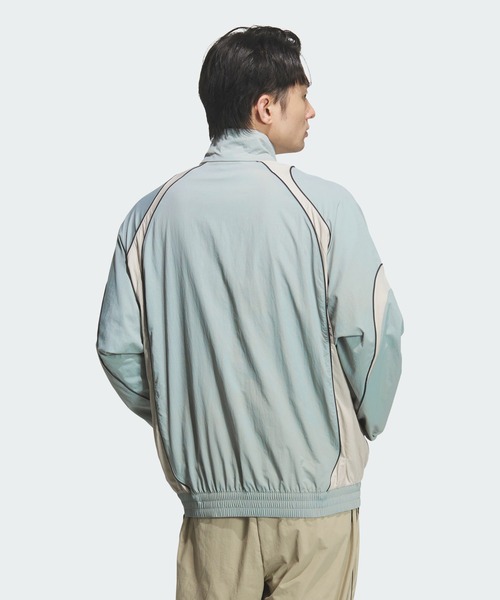 adidas(アディダス)の「BRAND LOVE ルーズフィット ライト ウーブン ジャケット / アディダス adidas(ジャージ・メンズ・グリーン・X-LARGE/XX-LARGE/SMALL/MEDIUM/LARGE/3XL/X-SMALL)」の2枚目の写真