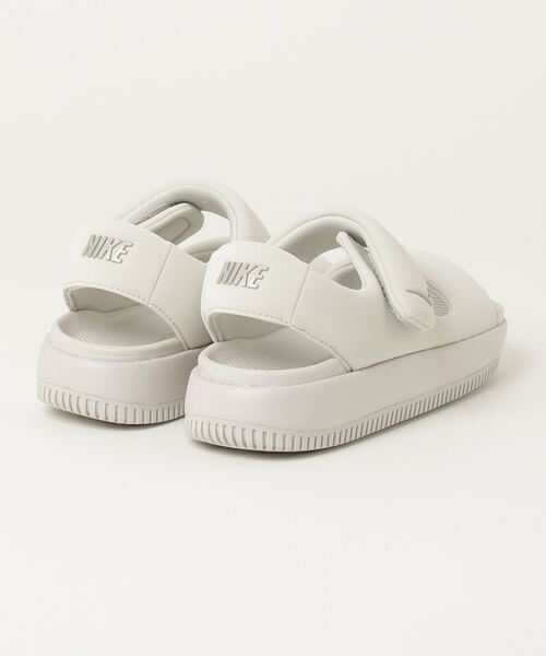 NIKE（ナイキ）の「NIKE/ナイキ WSカルムサンダル（サンダル・レディース・ホワイト・23cm/22cm/25cm/24cm/26cm）」の2枚目の写真