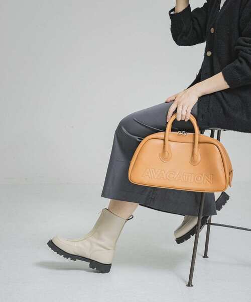 CAMINANDO(カミナンド)の「『25周年別注』CAMINANDO CENTER ZIP BOOTS(ブーツ・レディース・ブラック/アイボリー・6/8/7)」の4枚目の写真