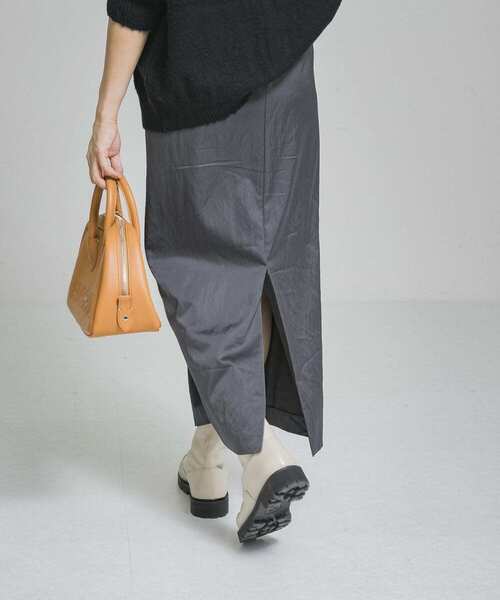 CAMINANDO(カミナンド)の「『25周年別注』CAMINANDO CENTER ZIP BOOTS(ブーツ・レディース・ブラック/アイボリー・6/8/7)」の10枚目の写真