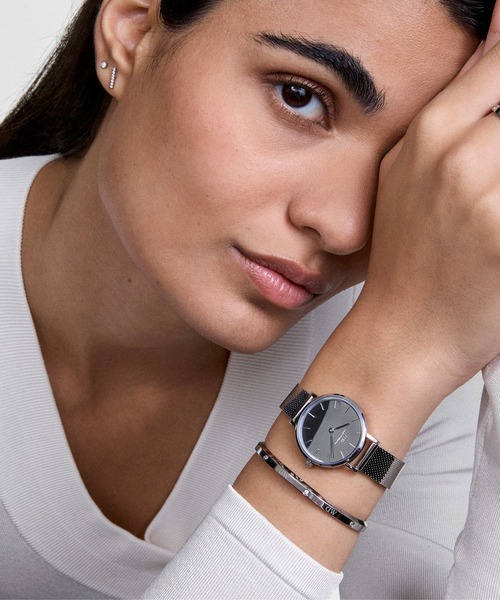 Daniel Wellington(ダニエルウェリントン)の「Petite Reflection 28MM ローズゴールド/シルバー/ゴールド(アナログ腕時計・レディース・ブラック/イエローゴールド/シルバー/ピンクゴールド・28mm)」の1枚目の写真