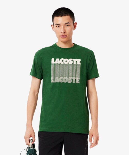 LACOSTE(ラコステ)の「グラフィカルブランドネームロゴウルトラドライTシャツ(Tシャツ/カットソー・メンズ・ライトブルー/グリーン・3/4/5)」の1枚目の写真
