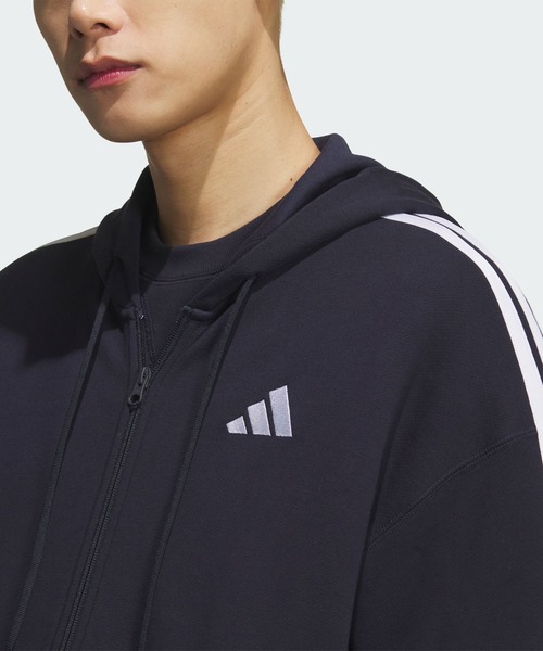 adidas(アディダス)の「エッセンシャルズ プラス ルーズフィット スリーストライプス フレンチテリー フルジップ パーカー / アディダス adidas(パーカー・メンズ・ブルー・X-LARGE/XX-LARGE/LARGE/MEDIUM/SMALL)」の5枚目の写真