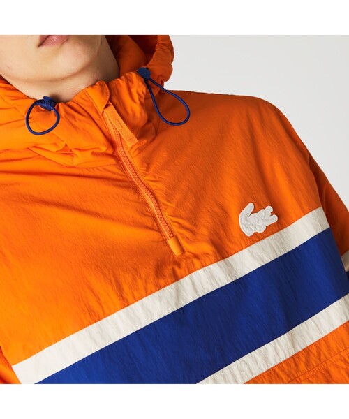 LACOSTE L!VE(ラコステライブ)の「LACOSTE L!VE ボーダープリントアノラック(カバーオール・メンズ・オレンジ・46/48/52/50)」の8枚目の写真