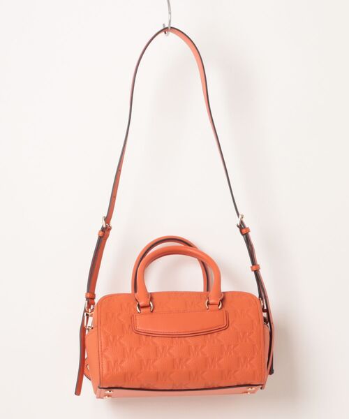 MICHAEL KORS(マイケルコース)の「JET SET TRAVEL ロゴエンボス レザー ダッフル クロスボディ エクストラスモール(ショルダーバッグ・レディース・オレンジ系・FREE)」の5枚目の写真