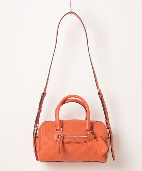 MICHAEL KORS(マイケルコース)の「JET SET TRAVEL ロゴエンボス レザー ダッフル クロスボディ エクストラスモール(ショルダーバッグ・レディース・オレンジ系・FREE)」の4枚目の写真