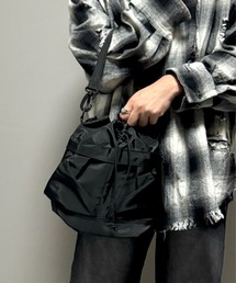 KOYA.（コヤ）の「ミニマルドローストリングバッグ / 3WAY巾着ショルダーバッグ/ミニナップサック（バックパック/リュック）」