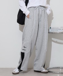 RE730（アールイーセブンサーティー）の「Piping track pants / パイピングトラックパンツ unisex（スウェットパンツ）」