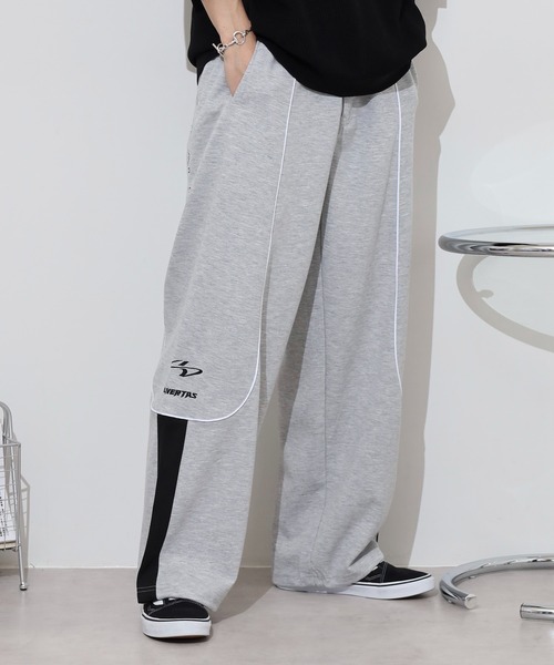 RE730(アールイーセブンサーティー)の「Piping track pants / パイピングトラックパンツ unisex(スウェットパンツ・メンズ・ネイビー/グレー/ブラック・XL/L/M)」の7枚目の写真